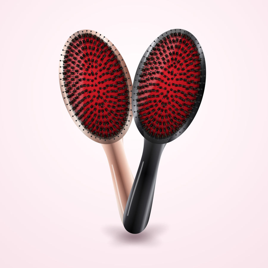 Illustration du Duo des anges : deux brosses ovales Brossange, finitions rose doré et noir
